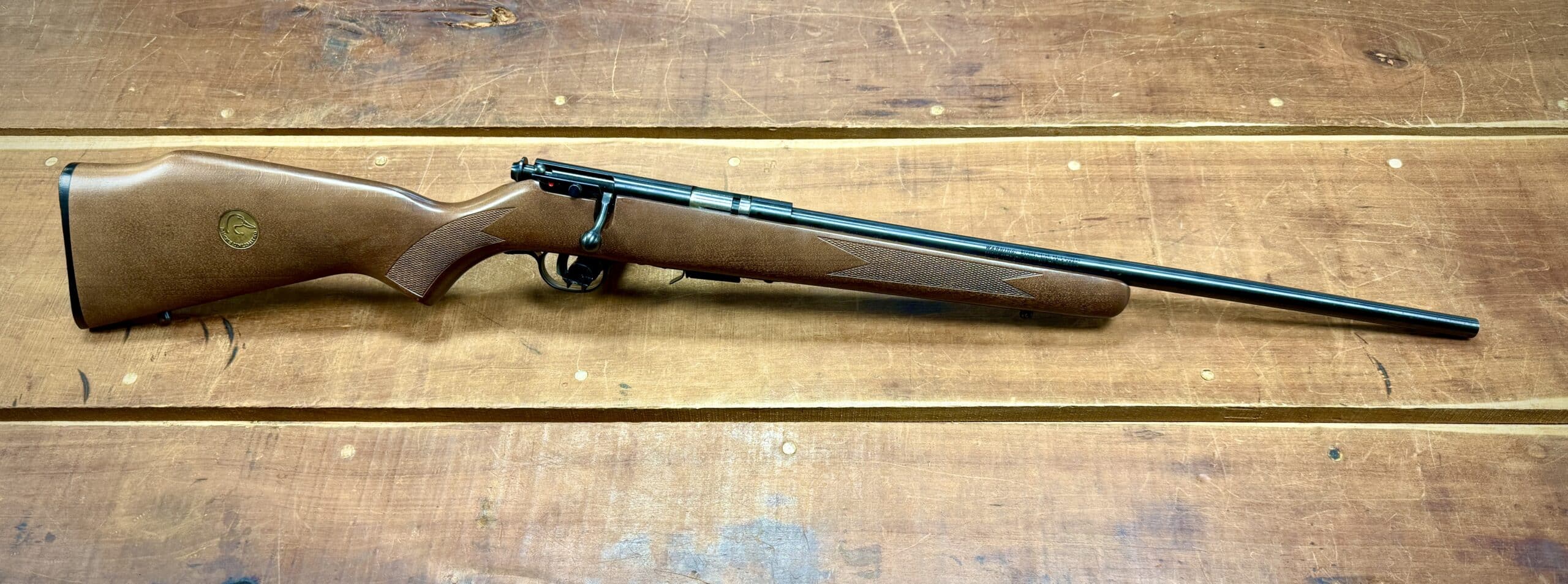 GENTLY USED SAVAGE ARMS 93R17 RIFLE WITH DUCKS UNLIMITED MEDALLION