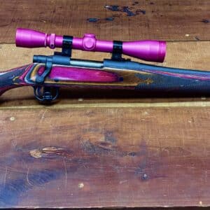 MOSSBERG 308 WITH CUSTOM COLORED LEUPOLD SCOPE & BOYD STOCK