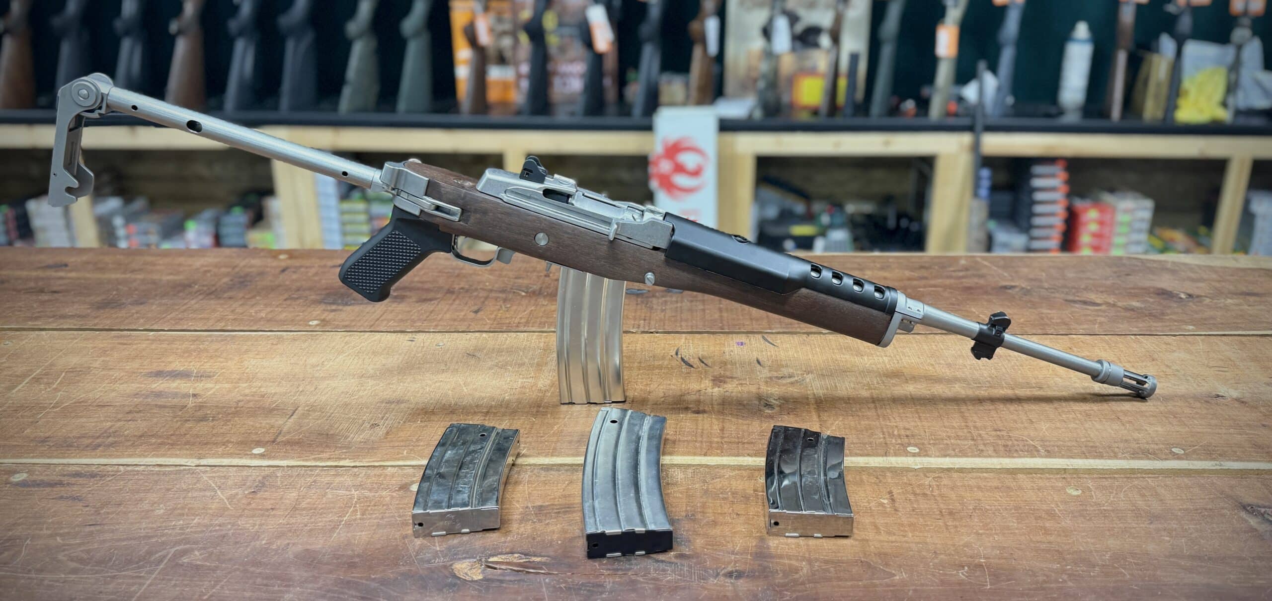 PREOWNED STAINLESS MINI 14 WITH 4 MAGAZINES WITH CARRY CASE